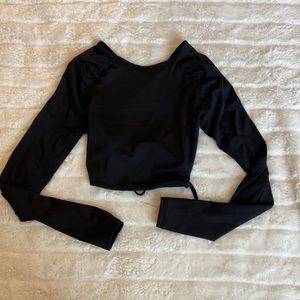 This top is a cute black top with an opened back from Charolette Russe!
